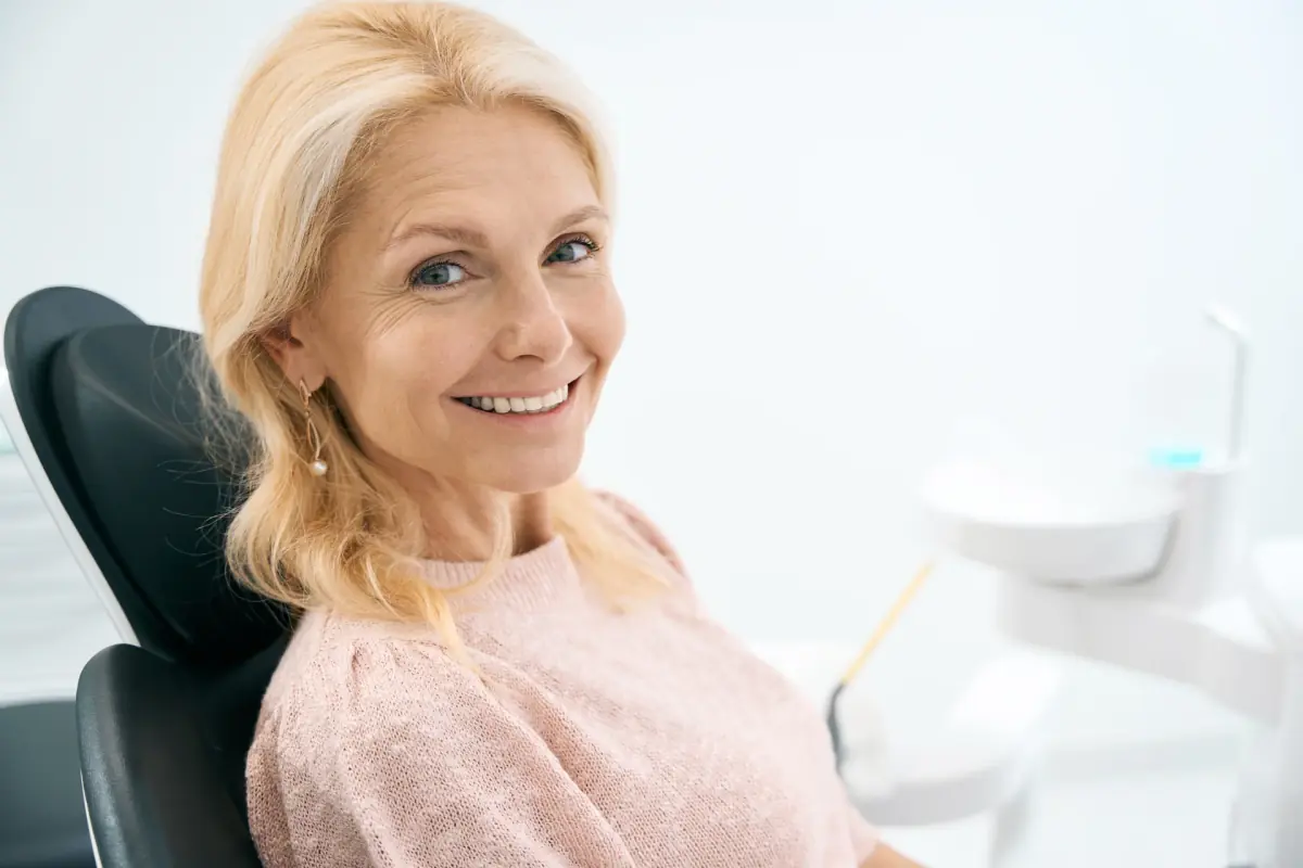 Smiling patient in the dental chair at Liberty Dental