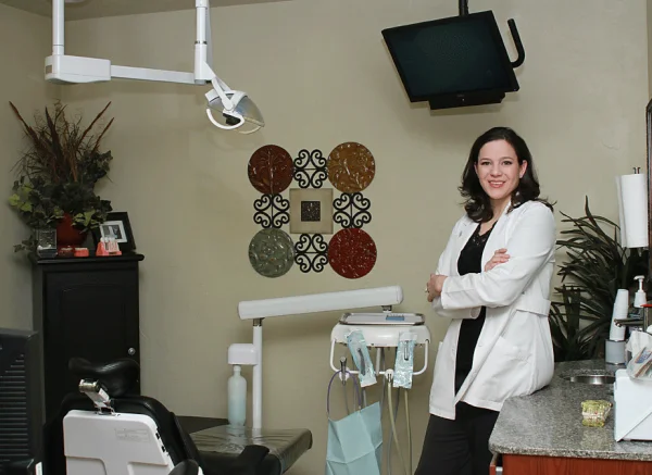 Dr. Woolford providing gentle dental care in the operatory